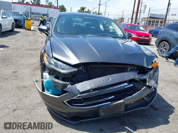 2017 Ford Fusion S with VIN 3FA6P0G73HR343623, listed as a IAAI auction lot 41957903 with 100,544 mi miles. Bid and sale history available at carsss.com. Image 6.