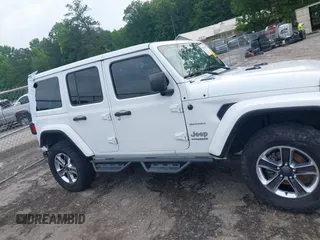 2019 Jeep Wrangler Unlimited Sahara with VIN 1C4HJXEN2KW558851, listed as a IAAI auction lot 42205584 with 175,701 mi miles and . Bid and sale history available at DreamBid. Image 13.