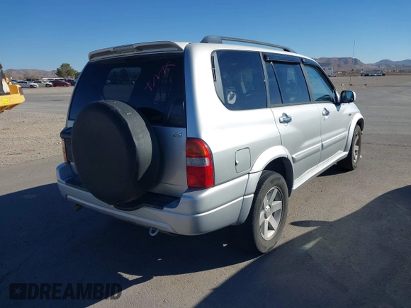 2002 Suzuki XL-7 LX with VIN JS3TY92V824104977, listed as a IAAI auction lot 41494699 with 161,262 mi miles. Bid and sale history available at carsss.com. Image 4.