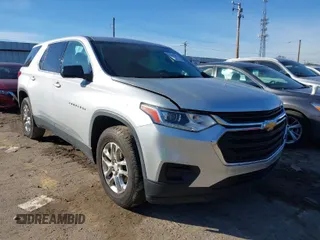 2019 Chevrolet Traverse LS z VIN 1GNERFKW0KJ129439, wystawiony jako IAAI lot #41454054 z przebiegiem 63 096 mil mil oraz . Historia ofert i sprzedaży dostępna na DreamBid. Obrazek 1.