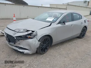 2025 Mazda 3 S Select Sport with VIN JM1BPABM5S1762571, listed as a IAAI auction lot 42186857 with 12,189 mi miles and . Bid and sale history available at DreamBid. Image 2.