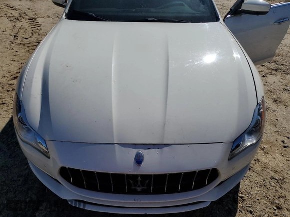 2017 Maserati Quattroporte z VIN ZAM56RRL1H1230279, wystawiony jako Copart lot #67067924 z przebiegiem Nie podano mil oraz Czysty tytuł • Clean title. Historia ofert i sprzedaży dostępna na DreamBid. Obrazek 11.