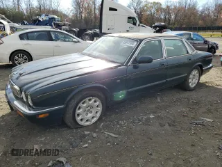 1998 Jaguar XJ with VIN SAJHX1241WC839104, listed as a Copart auction lot 81911744 with 61,956 mi miles and Clean Title. Bid and sale history available at DreamBid. Image 1.