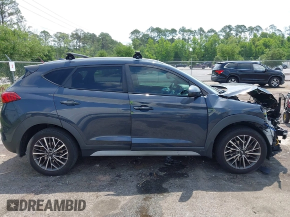 2019 Hyundai Tucson Sport z VIN KM8J33AL3KU937888, wystawiony jako IAAI lot #42310448 z przebiegiem 99 501 mil mil oraz . Historia ofert i sprzedaży dostępna na DreamBid. Obrazek 14.