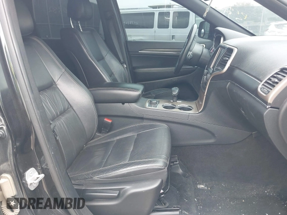 2014 Jeep Grand Cherokee Limited z VIN 1C4RJFBG6EC584346, wystawiony jako IAAI lot #42220382 z przebiegiem 159 272 mil mil oraz . Historia ofert i sprzedaży dostępna na DreamBid. Obrazek 5.