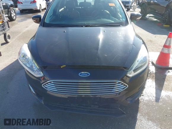 2017 Ford Focus Titanium с VIN 1FADP3J2XHL328847, выставлен на аукционе IAAI как лот 41740627 с пробегом 89 276 миль миль и . История ставок и продаж доступна на DreamBid. Изображение 12.