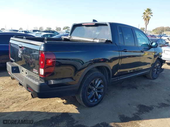 2021 Honda Ridgeline Sport with VIN 5FPYK3F14MB013671, listed as a IAAI auction lot 41361179 with 91,121 mi miles. Bid and sale history available at carsss.com. Image 4.