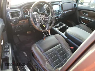 2016 Nissan Titan XD Platinum Reserve with VIN 1N6BA1F25GN506566, listed as a Copart auction lot 74627704 with 87,012 mi miles and Salvage Title. Bid and sale history available at carsss.com. Image 8.