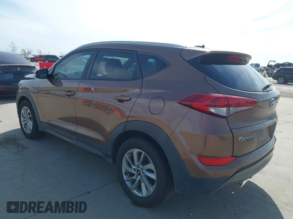2016 Hyundai Tucson Limited with VIN KM8J33A20GU137662, listed as a IAAI auction lot 41818149 with 120,010 mi miles. Bid and sale history available at carsss.com. Image 3.