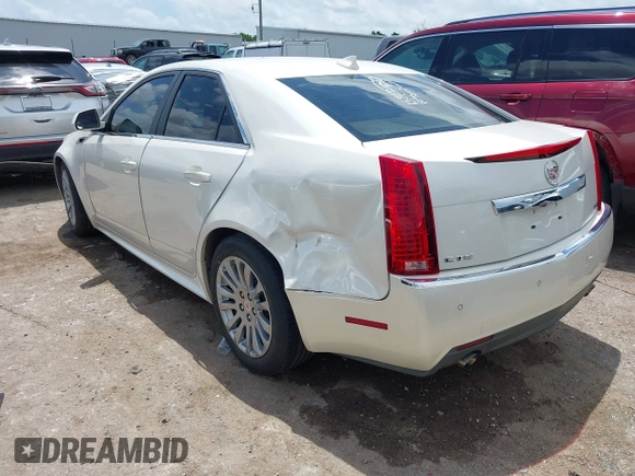 2012 Cadillac CTS Performance z VIN 1G6DK5E34C0116367, wystawiony jako IAAI lot #42373255 z przebiegiem 93 444 mil mil oraz . Historia ofert i sprzedaży dostępna na DreamBid. Obrazek 3.