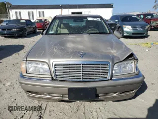 1998 Mercedes-Benz C 230/260/280/320 with VIN WDBHA23G8WA620777, listed as a Copart auction lot 77751154 with 144,032 mi miles and Salvage Title. Bid and sale history available at carsss.com. Image 5.