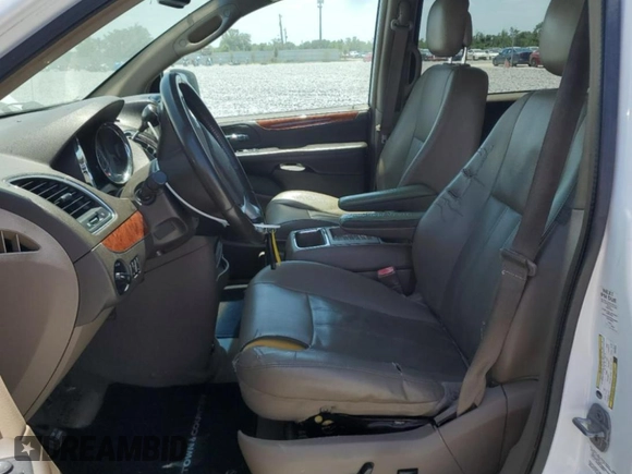 2014 Chrysler Town & Country Touring with VIN 2C4RC1BG7ER348325, listed as a Copart auction lot 53661405 with 111,056 mi miles and Clean Title. Bid and sale history available at DreamBid. Image 7.