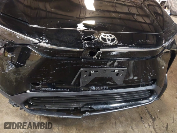 2024 Toyota bZ4X XLE z VIN JTMAAAAA3RA043494, wystawiony jako IAAI lot #41509723 z przebiegiem 5 279 mil mil oraz . Historia ofert i sprzedaży dostępna na DreamBid. Obrazek 21.