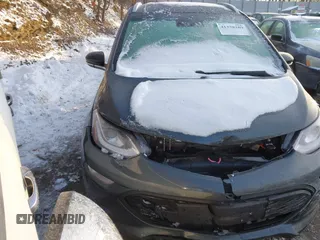 2021 Chevrolet Bolt EV Premier z VIN 1G1FZ6S09M4113694, wystawiony jako IAAI lot #41378289 z przebiegiem 40 979 mil mil oraz . Historia ofert i sprzedaży dostępna na DreamBid. Obrazek 1.