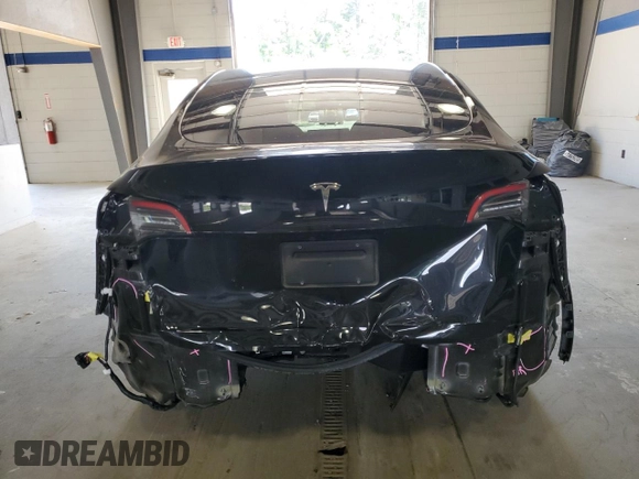 2021 Tesla Model Y Long Range z VIN 5YJYGAEE0MF298016, wystawiony jako Copart lot #55916955 z przebiegiem 59 578 mil mil oraz Szkoda całkowita • Salvage title. Historia ofert i sprzedaży dostępna na DreamBid. Obrazek 6.