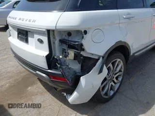 2015 Land Rover Range Rover Evoque Prestige z VIN SALVV2BG4FH076675, wystawiony jako IAAI lot #42138353 z przebiegiem 99 751 mil mil oraz . Historia ofert i sprzedaży dostępna na DreamBid. Obrazek 6.