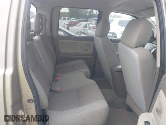 2006 Dodge Dakota SLT with VIN 1D7HE48N16S703072, listed as a IAAI auction lot 42156709 with 102,919 mi miles. Bid and sale history available at carsss.com. Image 8.