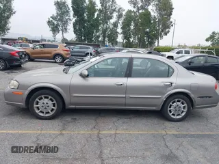 2000 Nissan Maxima GXE z VIN JN1CA31D0YT754624, wystawiony jako IAAI lot #42299290 z przebiegiem 81 958 mil mil oraz . Historia ofert i sprzedaży dostępna na DreamBid. Obrazek 14.