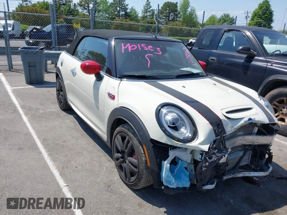 2021 MINI Convertible with VIN WMWWJ9C0XM3M07302, listed as a IAAI auction lot 42027854 with 30,921 mi miles and . Bid and sale history available at DreamBid. Image 1.
