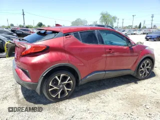 2018 Toyota C-HR XLE with VIN NMTKHMBX7JR011965, listed as a Copart auction lot 56213215 with 147,243 mi miles and Salvage Title. Bid and sale history available at DreamBid. Image 3.