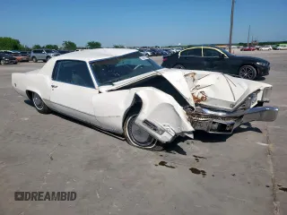 1970 Cadillac Eldorado z VIN H0257914, wystawiony jako Copart lot #52807145 z przebiegiem 46 277 mil mil oraz Szkoda całkowita • Salvage title. Historia ofert i sprzedaży dostępna na DreamBid. Obrazek 4.