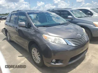 2012 Toyota Sienna XLE AAS with VIN 5TDYK3DC1CS279575, listed as a Copart auction lot 60350235 with 275,287 mi miles and Salvage title. Bid and sale history available at DreamBid. Image 4.