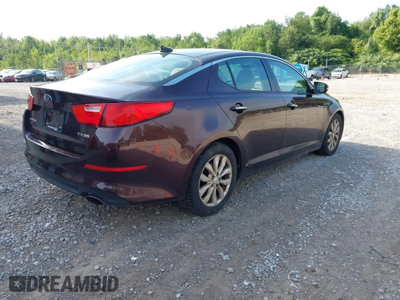 2015 Kia Optima EX with VIN 5XXGN4A75FG351223, listed as a IAAI auction lot 42732567 with 124,400 mi miles and . Bid and sale history available at DreamBid. Image 4.
