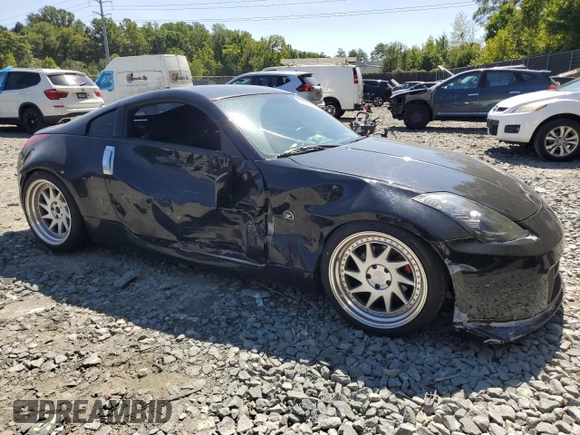 2004 Nissan 350Z Touring with VIN JN1AZ34E54T052703, listed as a Copart auction lot 70016184 with 170,619 mi miles and Salvage Title. Bid and sale history available at carsss.com. Image 4.