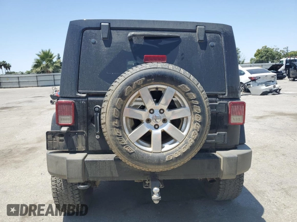 2017 Jeep Wrangler Unlimited Sahara with VIN 1C4BJWEG3HL614632, listed as a Copart auction lot 57525545 with 75,973 mi miles and Salvage title. Bid and sale history available at DreamBid. Image 6.