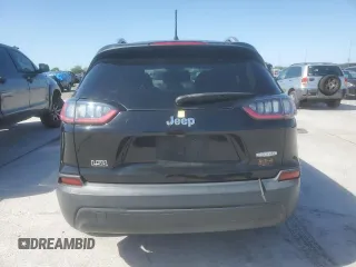 2019 Jeep Cherokee Latitude with VIN 1C4PJLCB9KD203992, listed as a Copart auction lot 52029165 with 135,534 mi miles and Salvage Title. Bid and sale history available at carsss.com. Image 6.