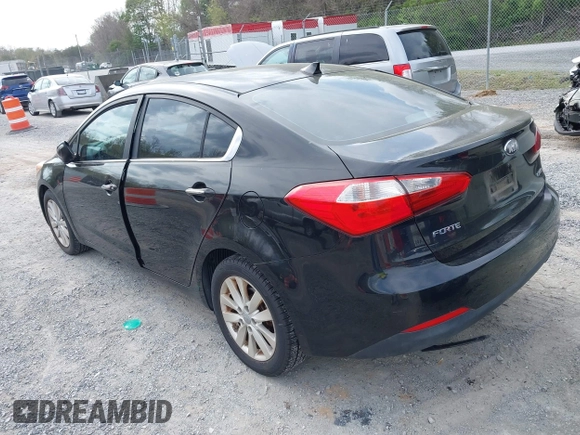 2014 Kia Forte EX with VIN KNAFX4A86E5049938, listed as a IAAI auction lot 42038755 with 82,016 mi miles. Bid and sale history available at carsss.com. Image 3.