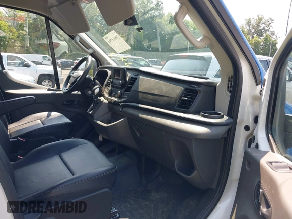 2023 Ford Transit Cargo with VIN 1FTBW3XG1PKB89459, listed as a IAAI auction lot 39961794 with 6,756 mi miles and . Bid and sale history available at carsss.com. Image 5.