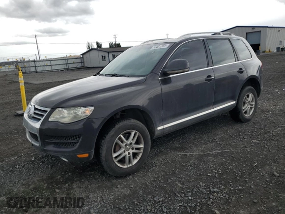 2008 Volkswagen Touareg V6 z VIN WVGBE77LX8D000610, wystawiony jako Copart lot #58434065 z przebiegiem 208 718 mil mil oraz Czysty tytuł • Clean title. Historia ofert i sprzedaży dostępna na DreamBid. Obrazek 1.