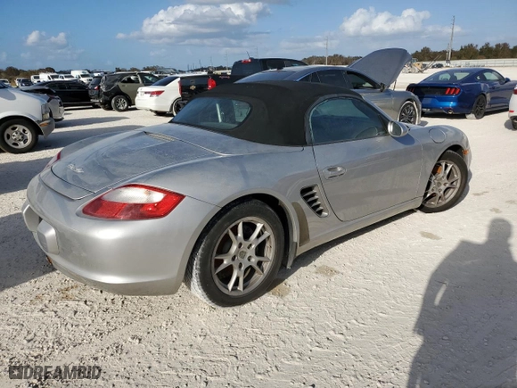 2007 Porsche Boxster with VIN WP0CA29867U711901, listed as a Copart auction lot 77470004 with 0 mi miles and Salvage Title. Bid and sale history available at carsss.com. Image 3.