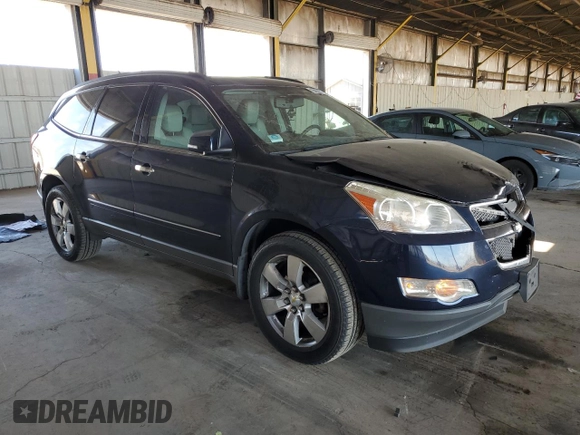 2012 Chevrolet Traverse LTZ z VIN 1GNKRLED9CJ332651, wystawiony jako Copart lot #55253655 z przebiegiem 128 113 mil mil oraz Szkoda całkowita • Salvage title. Historia ofert i sprzedaży dostępna na DreamBid. Obrazek 4.