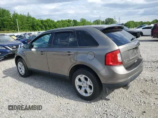 2014 Ford Edge SEL z VIN 2FMDK4JC7EBA47264, wystawiony jako Copart lot #54201255 z przebiegiem 135 408 mil mil oraz Szkoda całkowita • Salvage title. Historia ofert i sprzedaży dostępna na DreamBid. Obrazek 2.