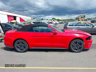 2022 Ford Mustang EcoBoost z VIN 1FATP8UH2N5124679, wystawiony jako IAAI lot #42271957 z przebiegiem 44 470 mil mil oraz . Historia ofert i sprzedaży dostępna na DreamBid. Obrazek 14.