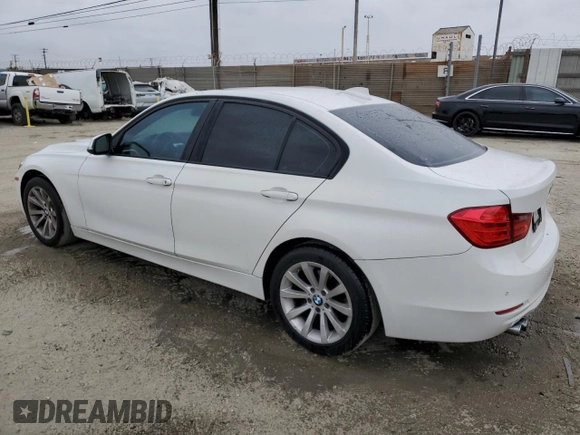 2013 BMW 3 Series 328i with VIN WBA3A5G57DNP23598, listed as a Copart auction lot 55677165 with 217,977 mi miles and Clean Title. Bid and sale history available at DreamBid. Image 2.