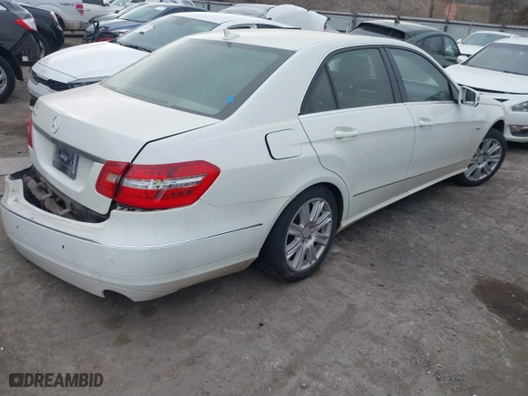 2012 Mercedes-Benz E-Class E 350 Luxury with VIN WDDHF5KB0CA588841, listed as a IAAI auction lot 41371990 with 108,480 mi miles. Bid and sale history available at carsss.com. Image 4.