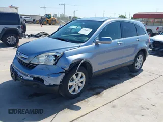2009 Honda CR-V EX-L with VIN JHLRE38719C001393, listed as a IAAI auction lot 41884431 with 186,677 mi miles and . Bid and sale history available at carsss.com. Image 2.