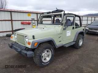 2001 Jeep Wrangler Sport with VIN 1J4FA49S91P354668, listed as a IAAI auction lot 41883227 with 197,043 mi miles and . Bid and sale history available at carsss.com. Image 2.