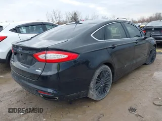 2015 Ford Fusion SE z VIN 3FA6P0H98FR273212, wystawiony jako IAAI lot #41952167 z przebiegiem 123 359 mil mil oraz . Historia ofert i sprzedaży dostępna na DreamBid. Obrazek 4.