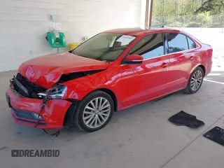 2015 Volkswagen Jetta Sedan 1.8T SE with VIN 3VWD17AJ3FM284712, listed as a IAAI auction lot 42052882 with 140,088 mi miles. Bid and sale history available at carsss.com. Image 2.
