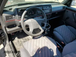 1991 Volkswagen GTI z VIN 3VWDB21G7MM023746, wystawiony jako Copart lot #66414904 z przebiegiem 105 926 mil mil oraz Nie do naprawy • Non repairable. Historia ofert i sprzedaży dostępna na DreamBid. Obrazek 8.