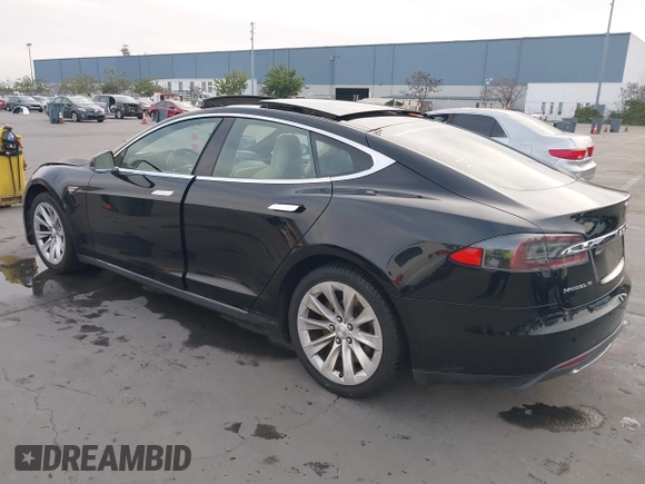 2016 Tesla Model S 70 with VIN 5YJSA1E11GF132015, listed as a IAAI auction lot 41408676 with 137,271 mi miles and . Bid and sale history available at DreamBid. Image 3.