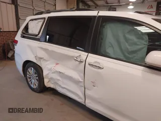 2011 Toyota Sienna XLE AAS with VIN 5TDYK3DC5BS130066, listed as a IAAI auction lot 41294340 with 156,591 mi miles and . Bid and sale history available at DreamBid. Image 6.