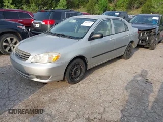 2004 Toyota Corolla CE with VIN 1NXBR32E94Z240957, listed as a IAAI auction lot 42134817 with 212,651 mi miles and . Bid and sale history available at DreamBid. Image 2.