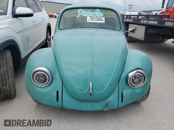 1969 Volkswagen Beetle with VIN 119682637V, listed as a Copart auction lot 70315404 with 59,148 mi miles and Salvage Title. Bid and sale history available at DreamBid. Image 5.