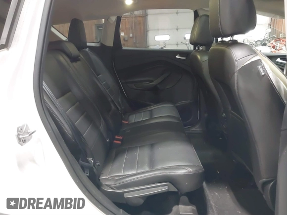 2016 Ford Escape Titanium with VIN 1FMCU9J95GUB02377, listed as a IAAI auction lot 41869557 with 88,441 mi miles. Bid and sale history available at carsss.com. Image 8.