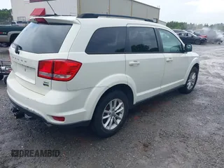 2015 Dodge Journey SXT z VIN 3C4PDCBG3FT561089, wystawiony jako IAAI lot #42634049 z przebiegiem 108 035 mil mil oraz . Historia ofert i sprzedaży dostępna na DreamBid. Obrazek 4.